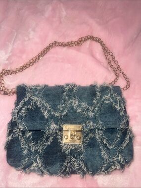 Blue denim mini bag with frayed edges and gold chain strap #denim #chain